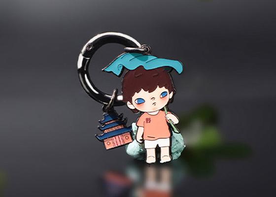 荷葉男孩金屬滴膠鑰匙扣定制